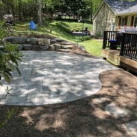 Flagstone Patio off Deck with Boulders