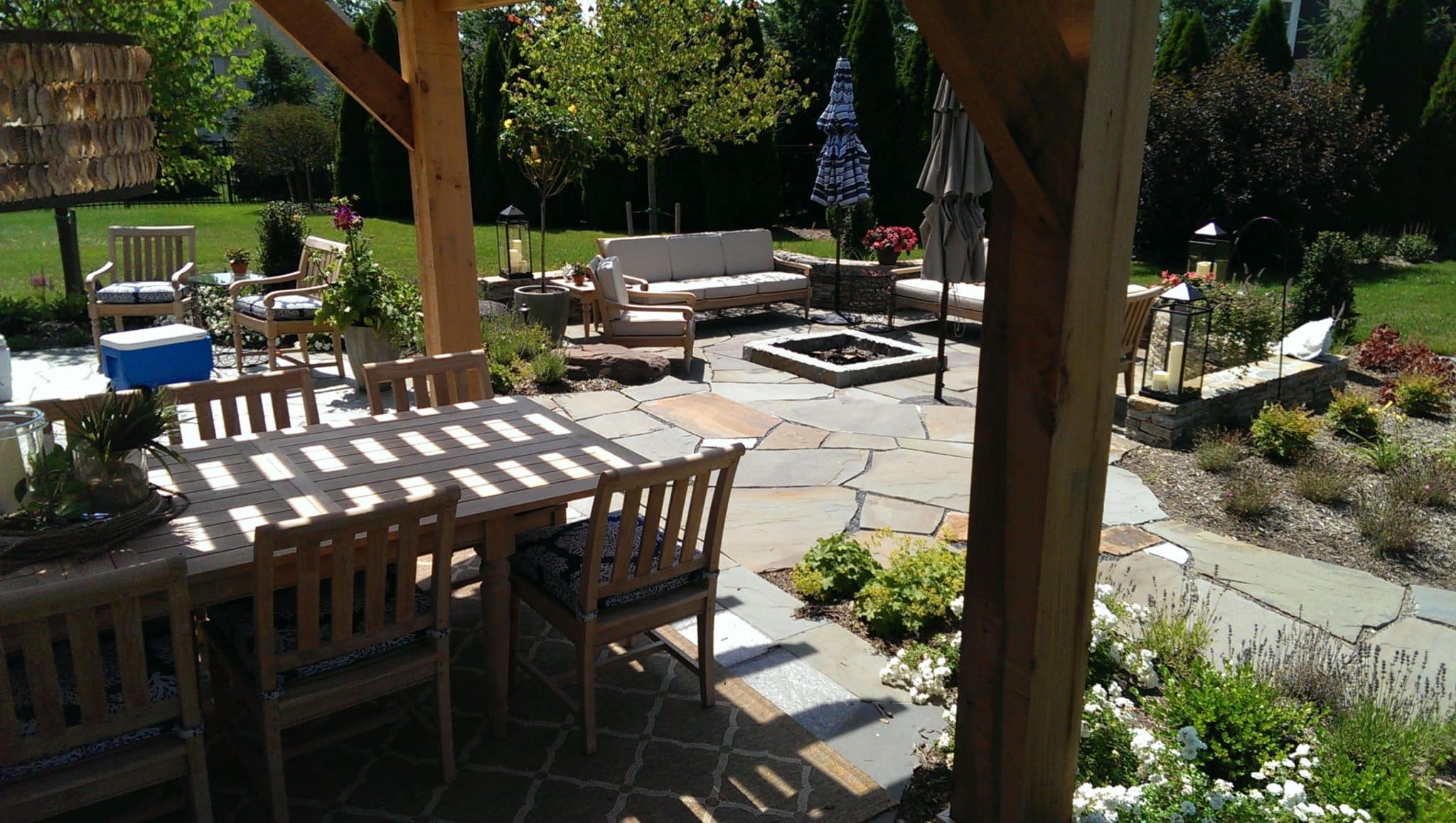 Flagstone Patio Shaded by Cedar Pergola